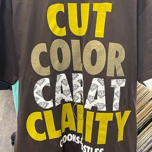 Brown Graphic T-Shirt with Bold Text